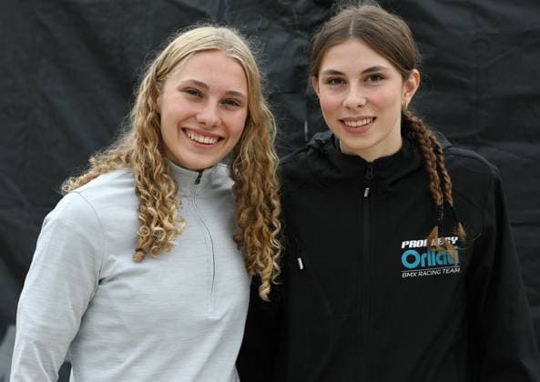 March 28, 2025, Verona, Veneto, Italy: Sisters INES CLAESSENS and JADE CLAESSENS of Switzerland have fun ahead of the UEC BMX European Cup Round 1 in Verona, Italy Verona Italy - ZUMAc179 20250328_zep_c179_005 Copyright: xMickaelxChavetx