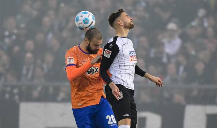 28.03.2025, xemx, Fussball 2.Bundesliga, SSV Ulm 1846 - SV Darmstadt 98 v.l. Aleksandar Vukotic (SV Darmstadt 98), Felix Higl (SSV Ulm 1846) Zweikampf, Aktion, action, battle for the ball (DFL DFB REGULATIONS PROHIBIT ANY USE OF PHOTOGRAPHS as IMAGE SEQUENCES and or QUASI-VIDEO) Ulm