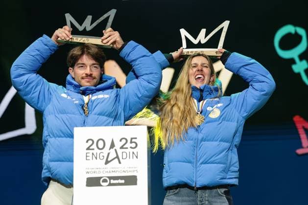 FREE STYLE, SNOWBOARD - FIS SX and SB WC Engadin 2025 SANKT MORITZ,SWITZERLAND,29.MAR.25 - SNOWBOARD - FIS Freestyle Ski and Snowboard World Championships, Champions Celebration, award ceremony, Snowboard Cross, mixed team. Image shows Loan Bozzolo and Julia Pereira de Sousa (FRA). Keywords: trophy.  GEPAxpictures xMatthiasxTrinkl