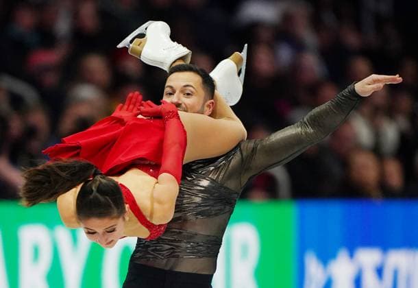 Sport Themen der Woche KW13 Sport Bilder des Tages Lilah Fear and Lewis Gibson of Great Britain perform in the Ice Dance Free Dance program at the 2025 ISU World Figure skating, Eiskunstlauf Championships at TD Garden in Boston, Massachusetts on Saturday, March 29, 2025.  BOS20250329437 AMANDAxSABGA