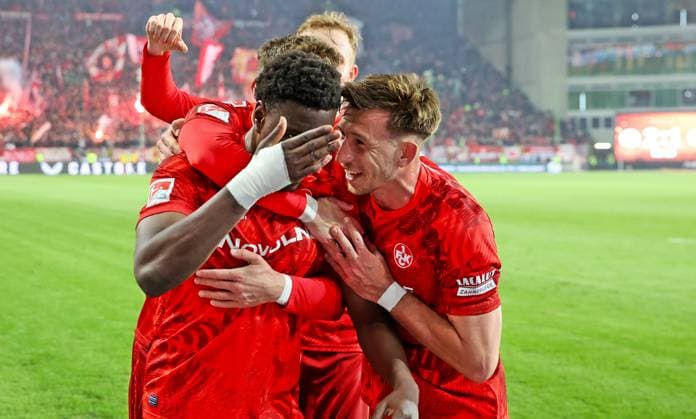 29.03.2025, xmohx, Fussball 2.Bundesliga, 1.FC Kaiserslautern - Fortuna Duesseldorf v.l. Ragnar Ache und Daniel Hanslik (Kaiserslautern) bejubeln das 2-1 gemeinsam mit Tim Breithaupt (hinten) (DFL DFB REGULATIONS PROHIBIT ANY USE OF PHOTOGRAPHS as IMAGE SEQUENCES and or QUASI-VIDEO) Kaiserslautern