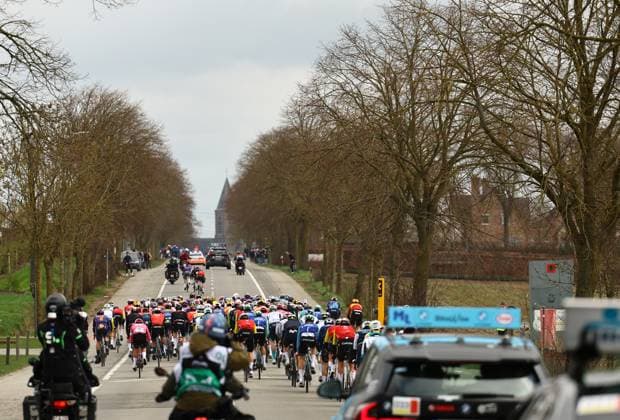 The pack of riders pictured in action during the men elite Gent-Wevelgem - In Flanders Fields one day cycling race, 250.3 km from Ieper to Wevelgem, Sunday 30 March 2025. DAVIDxPINTENS  x117140317x