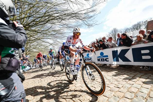 Belgian Tim Merlier of Soudal Quick-Step pictured in action on the Kemmelberg during the men elite Gent-Wevelgem - In Flanders Fields one day cycling race, 250.3 km from Ieper to Wevelgem, Sunday 30 March 2025. DAVIDxPINTENS  x117203346x