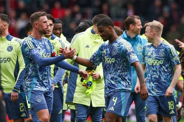 2025-03-30 PSV v AFC Ajax - Dutch Eredivisie EINDHOVEN, NETHERLANDS - MARCH 30: Jordan Henderson of AFC Ajax, Jorrel Hato of AFC Ajax celebrating their sides win during the Dutch Eredivisie match between PSV and AFC Ajax at Philips Stadion on March 30, 2025 in Eindhoven, Netherlands. Eindhoven Philips Stadion Netherlands Content not available for redistribution in The Netherlands directly or indirectly through any third parties. Copyright: xBenxGalx
