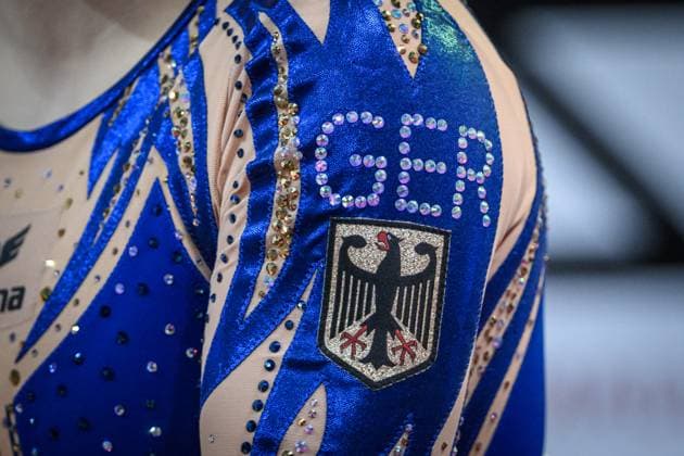 Sport Themen der Woche KW13 Sport Bilder des Tages Feature, Symbol Turnen, Trikot, Deutschland, Germany, Bundesadler 40. EnBW DTB Pokal, 30.03.2025, Stuttgart (Porsche Arena), GER 40. EnBW DTB Pokal, 30.03.2025, Stuttgart (Porsche Arena), GER Stuttgart *** Feature, Symbol Turnen, Trikot, Deutschland, Germany, Bundesadler 40 EnBW DTB Pokal, 30 03 2025, Stuttgart Porsche Arena , GER 40 EnBW DTB Pokal, 30 03 2025, Stuttgart Porsche Arena , GER Stuttgart Copyright: xSandyxDinkelackerx EP_SDR