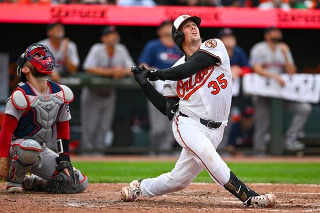 Sport Bilder des Tages Baltimore Orioles catcher Adley Rutschman (35) gets crossed up on a fly out to the Boston Red Sox during the seventh inning of the home opener game at Camden Yards in Baltimore, Maryland, on Monday, March 31, 2025.  BAP20250331115 DAVIDxTULIS