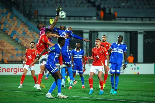 Al Ahly FC vs Al Hilal SC - TotalEnergies CAF Champions League - Quarter Final 1st Leg Issa Fofana The goalkeeper of Al Hilal SC trying to catch the ball in the match between Al Ahly FC vs Al Hilal SC in the 1st leg of the Quarter Final of Total Energies CAF Champions League on April 1, 2025 Cairo Cairo Egypt Copyright: xMohamedxTageldinx