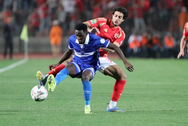 CAF Champions League - Quarter Final - First Leg - Al Ahly vs Al Hilal Omdurman Mohamed Hany (R) of Al Ahly in action against Jean Claude Girmugisha of Al Hilal Omdurman during the CAF Champions League Quarter Final First Leg match between Al Ahly vs Al Hilal Omdurman, in Cairo, Egypt,April 01 2025. Cairo Egypt Copyright: xMatrixxImagesx xKhaledxElfiqix 