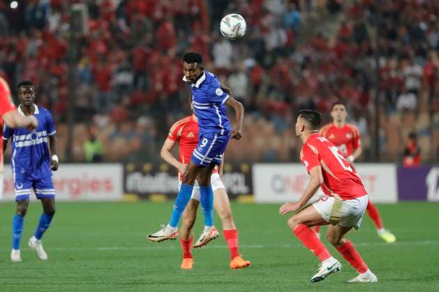 (250402) -- CAIRO, April 2, 2025 -- Yasir Mozamil (top) of Al-Hilal competes during during the Confederation of African Football (CAF) Champions League quarterfinals football match between Al Ahly of Egypt and Al-Hilal of Sudan in Cairo, Egypt, on April 1, 2025. ) (SP)EGYPT-CAIRO-FOOTBALL-CAF CHAMPIONS LEAGUE-QUARTERFINALS AhmedxGomaa 
