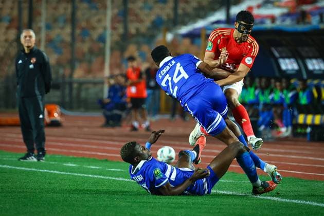 Al Ahly FC vs Al Hilal SC - TotalEnergies CAF Champions League - Quarter Final 1st Leg Yahia Attiatallah fall down after a strong clash with Steven Ebuela in the match between Al Ahly FC vs Al Hilal SC in the 1st leg of the Quarter Final of Total Energies CAF Champions League on April 1, 2025 Cairo Cairo Egypt Copyright: xMohamedxTageldinx