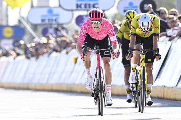 American Neilson Powless of EF Education-EasyPost wins ahead of Belgian Wout van Aert of Team Visma-Lease a Bike and Belgian Tiesj Benoot of Team Visma-Lease a Bike in the men elite race of the Dwars Door Vlaanderen cycling event, 184,2km from Roeselare to Waregem, Wednesday 02 April 2025. JASPERxJACOBS  x118312217x