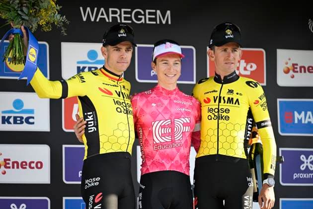 Dwars door Vlaanderen 2025 - Men Elite WAREGEM, BELGIUM - APRIL 02 : Van Aert Wout (BEL) of Team Visma, Powless Neilson (USA) of EF Education - EasyPost and Benoot Tiesj (BEL) of Team Visma pictured during the podium ceremony of the 79th edition of the UCI World Tour Dwars door Vlaanderen Men Elite cycling race with start in Roeselare and finish in Waregem after 184,2 km on April 2, 2025 in Waregem, Belgium, 02 04 2025 ( motor drive Kenny Verfaillie - Waregem Belgium  Copyright: xJanxDexMeuleneirx