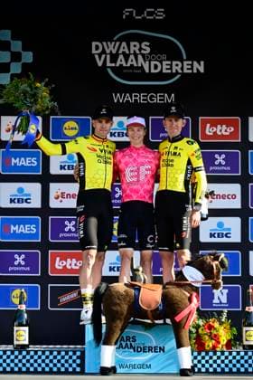 Dwars door Vlaanderen 2025 - Men Elite WAREGEM, BELGIUM - APRIL 02 : Van Aert Wout (BEL) of Team Visma, Powless Neilson (USA) of EF Education - EasyPost and Benoot Tiesj (BEL) of Team Visma pictured during the podium ceremony of the 79th edition of the UCI World Tour Dwars door Vlaanderen Men Elite cycling race with start in Roeselare and finish in Waregem after 184,2 km on April 2, 2025 in Waregem, Belgium, 02 04 2025 ( motor drive Kenny Verfaillie - Waregem Belgium  Copyright: xPeterxDexVoechtx