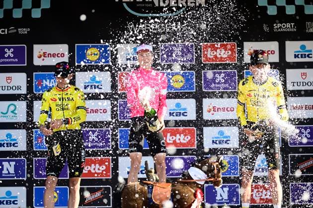 Dwars door Vlaanderen 2025 - Men Elite WAREGEM, BELGIUM - APRIL 02 : Van Aert Wout (BEL) of Team Visma, Powless Neilson (USA) of EF Education - EasyPost and Benoot Tiesj (BEL) of Team Visma pictured during the podium ceremony of the 79th edition of the UCI World Tour Dwars door Vlaanderen Men Elite cycling race with start in Roeselare and finish in Waregem after 184,2 km on April 2, 2025 in Waregem, Belgium, 02 04 2025 ( motor drive Kenny Verfaillie - Waregem Belgium  Copyright: xPeterxDexVoechtx