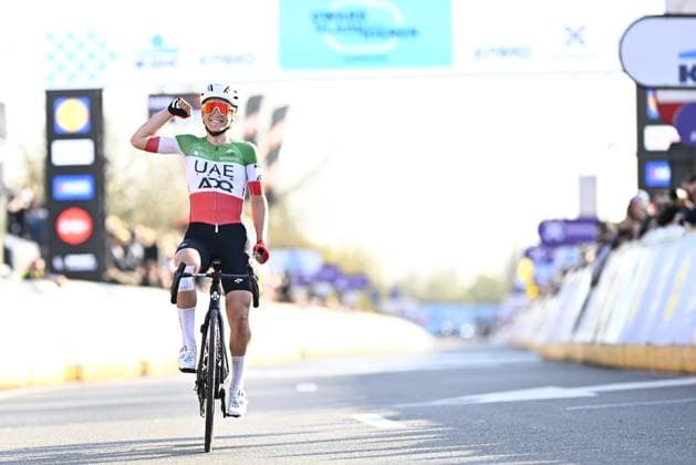 Italian Elisa Longo Borghini of UAE Team ADQ celebrates after winning the women elite race of the Dwars Door Vlaanderen cycling event, 128,5km from and to Waregem, Wednesday 02 April 2025. JASPERxJACOBS  x118338308x
