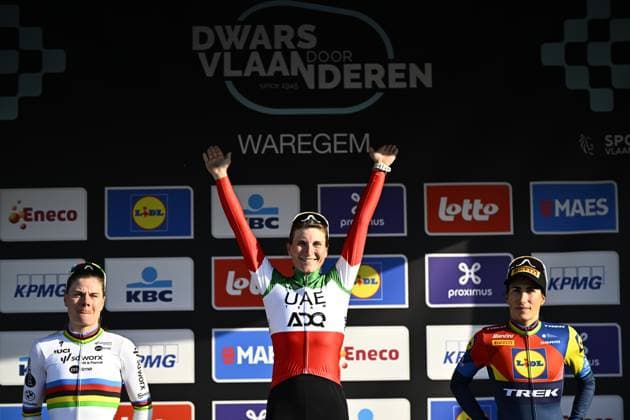 Belgian Lotte Kopecky of SD Worx-Protime, Italian Elisa Longo Borghini of UAE Team ADQ and Italian Elisa Balsamo of Lidl-Trek celebrate on the podium of the women elite race of the Dwars Door Vlaanderen cycling event, 128,5km from and to Waregem, Wednesday 02 April 2025. JASPERxJACOBS  x118341510x