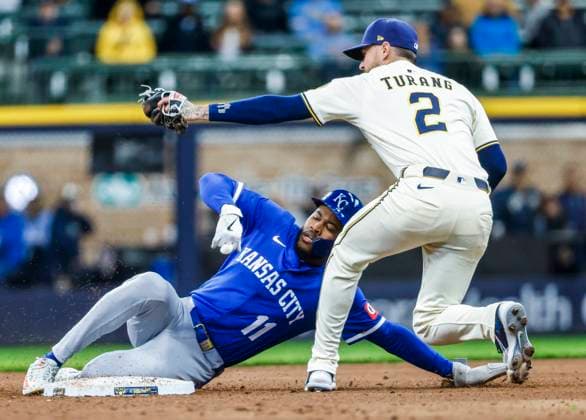 Kansas City Royals third baseman Maikel Garcia is caught trying to steal second base by Milwaukee Brewers second baseman Brice Turang in the tenth inning of the MLB, Baseball Herren, USA baseball game between the Kansas City Royals and the Milwaukee Brewers at American Family Field in Milwaukee, Wisconsin on Wednesday, April 02, 2025.  MIL202504028 TANNENxMAURY