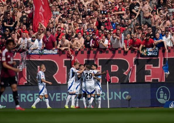 Hamburger SV Torjubel vor den Fans des 1.FC Nuernberg GER, 1.FC Nuernberg vs Hamburger SV, 2. Bundesliga, 28. Spieltag, Saison 2024 2025, 05.04.2025 DFL REGULATIONS PROHIBIT ANY USE OF PHOTOGRAPHS AS IMAGE SEQUENCES AND OR QUASI-VIDEO GER, 1.FC Nuernberg vs Hamburger SV, 2. Bundesliga, 28. Spieltag, Saison 2024 2025, 05.04.2025 Nuernberg