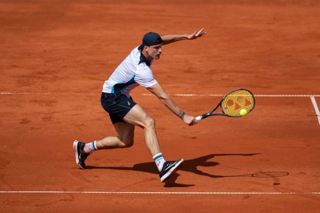 April 5, 2025 (Day 7), ATP, Tennis Herren 250, Tiriac Open presented by UniCredit Bank Surface Clay, Singles semifinal, Sebastian Baez ARG VS Marton Fucsovics HJK Helsinki Marton Fucsovics HUN ball action at the net