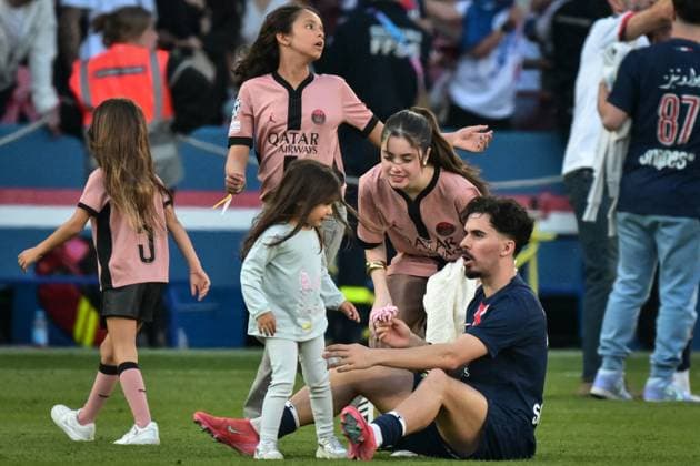 PSG celebrates Ligue 1 winning - FA Paris Saint-Germain’s midfielder Vitinha talks with Paris Saint-Germain’s midfielder Joao Neves’s partner Portugese actress Madalena Aragao after the French L1 football match between Paris Saint-Germain and Angers SCO at the Parc des Princes stadium in Paris on Avril 5, 2025. Photo by Firas Abdullah ABACAPRESS.COM Paris Île-de-France France  Copyright: xAbdullahxFiras ABACAx