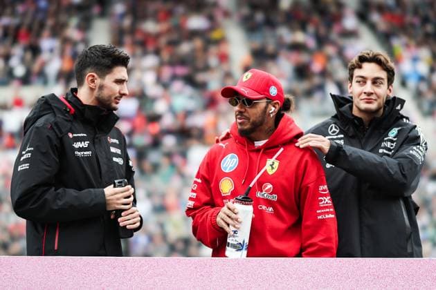 F1 Grand Prix Of Japan Lewis Hamilton of Great Britain and Scuderia Ferrari and George Russell of Great Britain and Mercedes-AMG PETRONAS F1 Team shake hands in the driver s parade before the F1 Grand Prix of Japan at Suzuka Circuit in Suzuka, Japan, on April 6, 2025. Suzuka Mie Japan  Copyright: xPaddockerx originalFilename:paddocker-f1grandp250406_np7hw.jpg