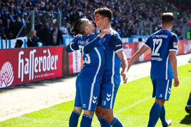 Torjubel - Torschütze Baris Atik (1. FC Magdeburg,23) trifft zum 1-0 mit Tobias Müller (1. FC Magdeburg,5) - 2. Fußball Bundesliga Saison 2024-2025 1. FC Magdeburg vs. 1. FC Kaiserslautern in der Avnet Arena in Magdeburg - Aktion,Fußball,Mann,Männer,Deutschland,06.04.2025
