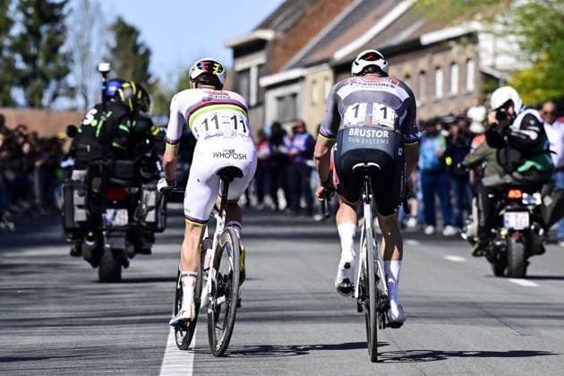 Dutch Mathieu van der Poel of Alpecin-Deceuninck and Slovenian Tadej Pogacar of UAE Team Emirates pictured in action during the men s race of the Ronde van Vlaanderen Tour des Flandres Tour of Flanders one day cycling race, 268,9km from Brugge to Oudenaarde, Sunday 06 April 2025. DIRKxWAEM  x119624025x