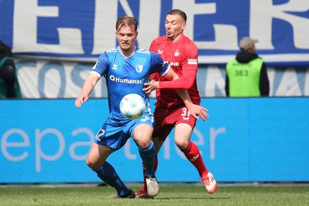 06.04.2025, xmohx, Fussball 2.Bundesliga, 1.FC Magdeburg - 1.FC Kaiserslautern v.l. Alexander Ahl-Holmström (1.FC Magdeburg) Luca Sirch (1. FC Kaiserslautern) Zweikampf, Aktion, action, battle for the ball (DFL DFB REGULATIONS PROHIBIT ANY USE OF PHOTOGRAPHS as IMAGE SEQUENCES and or QUASI-VIDEO) Magdeburg