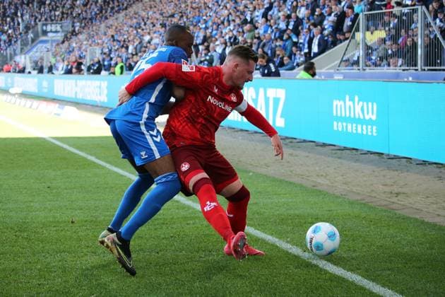 06.04.2025, xmohx, Fussball 2.Bundesliga, 1.FC Magdeburg - 1.FC Kaiserslautern v.l. Silas Gnaka (1.FC Magdeburg) Marlon Ritter (1. FC Kaiserslautern) Zweikampf, Aktion, action, battle for the ball (DFL DFB REGULATIONS PROHIBIT ANY USE OF PHOTOGRAPHS as IMAGE SEQUENCES and or QUASI-VIDEO) Magdeburg