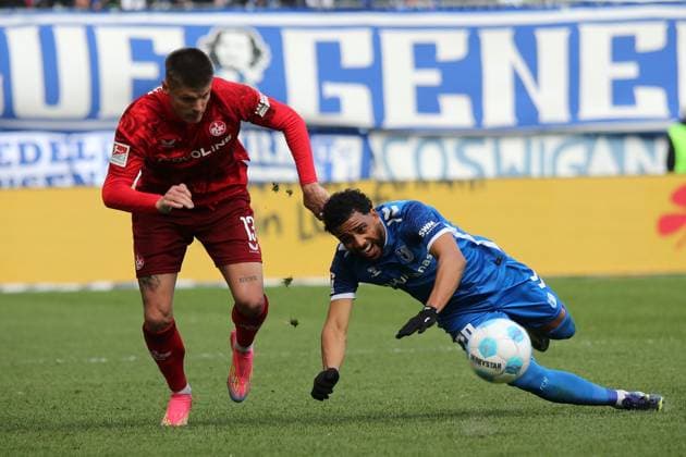 06.04.2025, xmohx, Fussball 2.Bundesliga, 1.FC Magdeburg - 1.FC Kaiserslautern v.l. Erik Wekesser (1. FC Kaiserslautern) Xavier Amaechi (1.FC Magdeburg) Zweikampf, Aktion, action, battle for the ball (DFL DFB REGULATIONS PROHIBIT ANY USE OF PHOTOGRAPHS as IMAGE SEQUENCES and or QUASI-VIDEO) Magdeburg