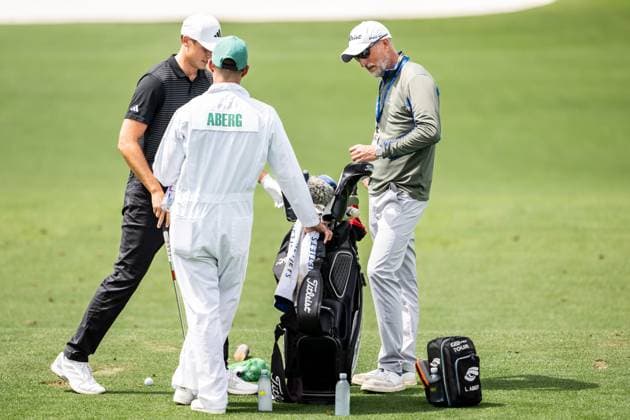 250406 Ludvig Aberg of Sweden with caddie Joe Skovron and coach Hans Larsson during a practice at the range prior to the 2025 Masters Golf Tournament on April 6, 2025 in Augusta. Photo: Petter Arvidson BILDBYRAN kod PA PA1003 golf masters bbeng the masters augusta sverige Copyright: PETTERxARVIDSON BB250406PA024