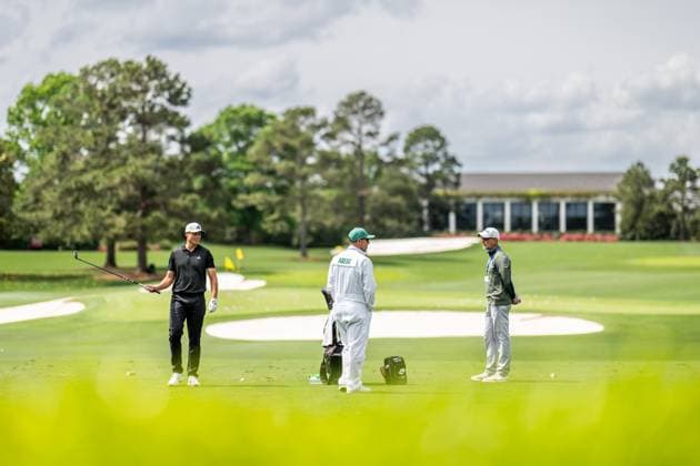 250406 Ludvig Aberg of Sweden with coach Hans Larsson and caddie Joe Skovron during a practice at the range prior to the 2025 Masters Golf Tournament on April 6, 2025 in Augusta. Photo: Petter Arvidson BILDBYRAN kod PA PA1003 golf masters bbeng the masters augusta sverige Copyright: PETTERxARVIDSON BB250406PA030