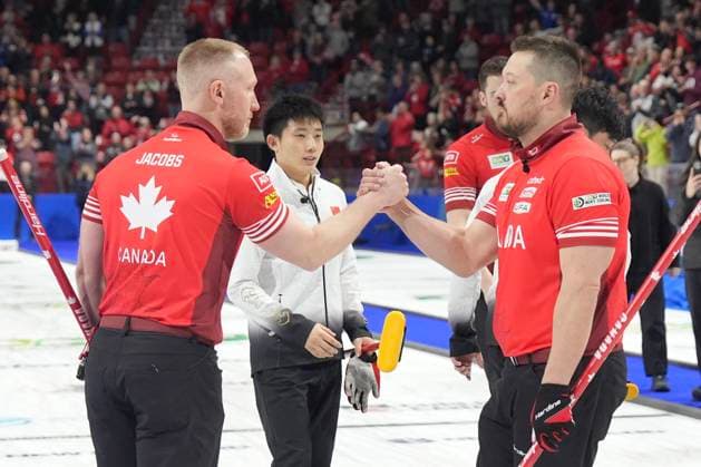 April 6, 2025, Moose Jaw, Sask, CAN: Skip Brad Jacobs congratulates lead Ben Hebert after Canada s 11-2 win over China in the bronze-medal game at the BKT World Men s Curling Championship in Moose Jaw, Sask., on Sunday, April 6, 2025. Brad Jacobs; Ben Hebert  - ZUMAc35_ 20250406_zaf_c35_044 Copyright: xChrisxYoungx