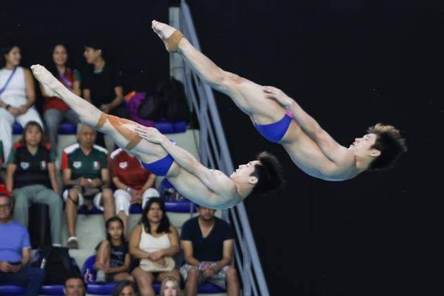 (250407) -- GUADALAJARA, April 7, 2025 -- Hu Yukang Zheng Jiuyuan of China compete during the men s Synchronized 3m springboard final at the World Aquatics Diving World Cup 2025 in Guadalajara, Jalisco, Mexico, on April 6, 2025. (Photo by Xinhua) (SP)MEXICO-JALISCO-GUADALAJARA-DIVING-WORLD CUP-MEN S SYNCHRONIZED 3M SPRINGBOARD-FINAL DianaxMarquez 