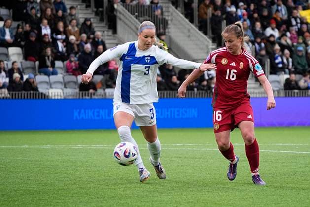 Tinja-Riikka Korpela of Finland and Diana Csanyi of Hungary during the UEFA WomenÂ s Nations League match between Finland and Hungary at the Tammela Stadion on 8th April 2025 in Tampere, Finland. (Kalle Parkkinen Newspix24)  Copyright: xKALLExPARKKINENx _KP95860