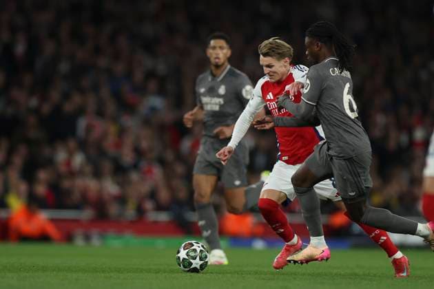 April 8, 2025, London, England, UNITED KINGDOM: Eduardo Camavinga of Real Madrid and Martin Odegaard of Arsenal in action during the UEFA Champions League 2024 25 Quarter Final First Leg match between Arsenal FC and Real Madrid C.F. at Arsenal Stadium on April 08, 2025 in London, England. London UNITED KINGDOM - ZUMAa181 20250408_zaa_a181_094 Copyright: xIsbelxInfantesx