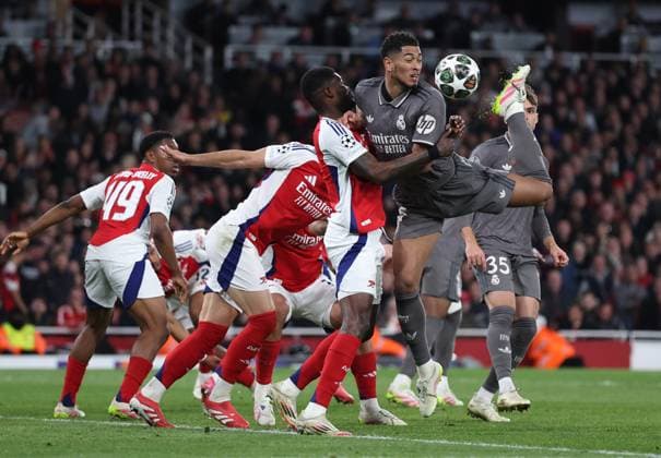 London, England, 8th April 2025. Jude Bellingham of Real Madrid attempts a back flick towards goal during the Arsenal vs Real Madrid UEFA Champions League match at the Emirates Stadium, London. Picture credit should read: David Klein Sportimage EDITORIAL USE ONLY. No use with unauthorised audio, video, data, fixture lists, club league logos or live services. Online in-match use limited to 120 images, no video emulation. No use in betting, games or single club league player publications. SPI_060_DK_Arsenal_Real_Madrid SPI-3819-0071