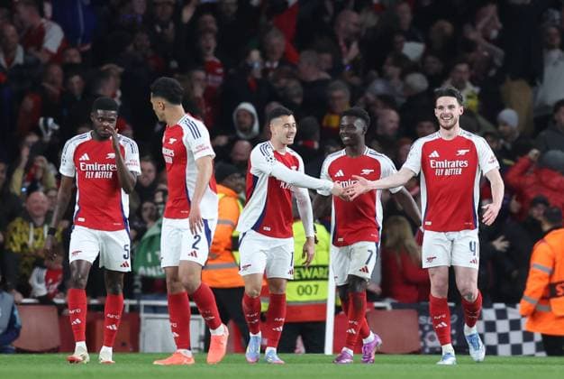 London, England, 8th April 2025. Declan Rice of Arsenal (r) celebrates scoring the first goal during the Arsenal vs Real Madrid UEFA Champions League match at the Emirates Stadium, London. Picture credit should read: David Klein Sportimage EDITORIAL USE ONLY. No use with unauthorised audio, video, data, fixture lists, club league logos or live services. Online in-match use limited to 120 images, no video emulation. No use in betting, games or single club league player publications. SPI_063_DK_Arsenal_Real_Madrid SPI-3819-0074