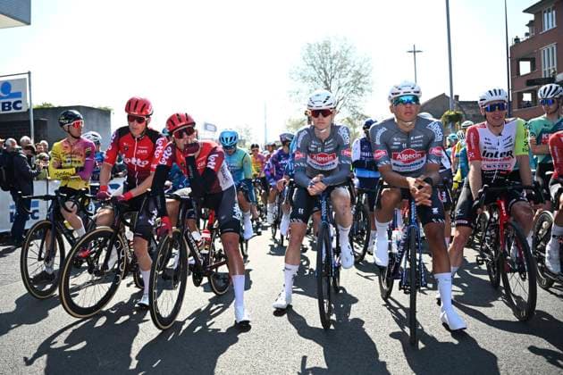 Scheldeprijs 2025 cycling race SCHOTEN, BELGIUM - APRIL 09 : riders of Lotto and riders of Alpecin-Deceuninck at the start during the Men Elite UCI 1.Pro 113th Flanders Classics Scheldeprijs cycling race with start in Terneuzen and finish in Schoten (205,2 km) on April 09, 2025 in Schoten, Belgium, 09 04 2025 ( Motordriver Guy De Vuyst & Schoten Belgium  Copyright: xTomasxSiskx