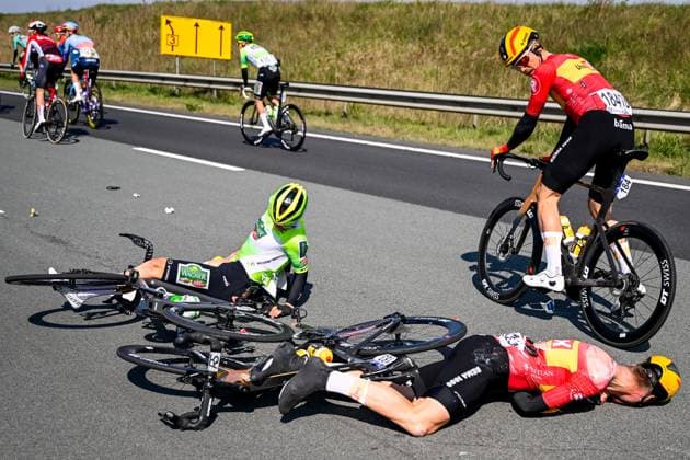 Norwegian Jonas Iversby Hvideberg of Uno-X Mobility lies injured on the ground after a crash during the men s race of the 113th edition of the Scheldeprijs one day cycling event, 202,8 km from Terneuzen, the Netherlands to Schoten, Belgium on Wednesday 09 April 2025. TOM GOYVAERTS TomxGoyvaerts  x120376306x
