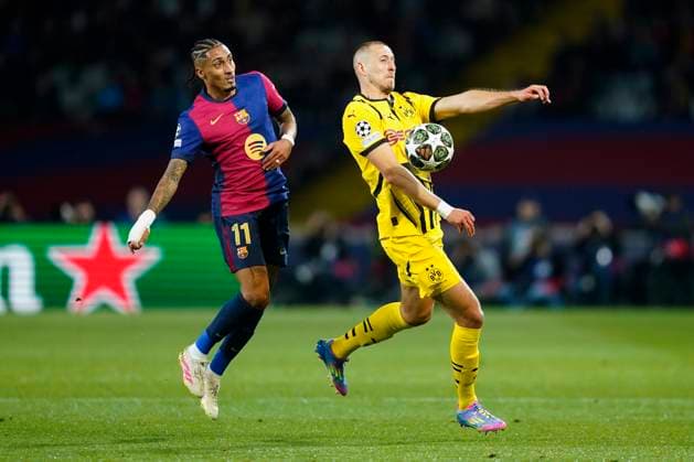 ESP: FC Barcelona, Barca v Borussia Dortmund. UEFA Champions League match. Quarter-Finals, firs leg Walderman Anton and Raphael Dias Belloli Raphinha of FC Barcelona during the UEFA Champions League match, Quarter-Finals, firs leg, between FC Barcelona and Borussia Dortmund played at Lluis Companys Stadium on April 9 2025 in Barcelona Spain. kpng Copyright: xSergioxRuizx xImagox PS_250409_BAR_DOR_026