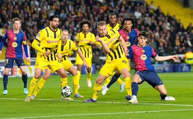 Sport Bilder des Tages 09.04.2025, xslx, Fussball UEFA Champions League, FC Barcelona, Barca - Borussia Dortmund v.l. Emre Can (Borussia Dortmund), Julian Ryerson (Borussia Dortmund), Pau Cubarsi (FC Barcelona) (UEFA REGULATIONS PROHIBIT ANY USE OF PHOTOGRAPHS as IMAGE SEQUENCES and or QUASI-VIDEO) Barcelona