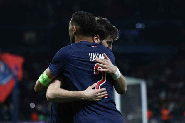 April 9, 2025, Paris, Ile-De-France, France: KVICHA KVARASTKHELIA 7 of PSG celebrates with his teammate ACHRAF HAKIMI for scoring their side s second goal in the UEFA 2024 25 Quarter-Final first leg game between PARIS SAINT GERMAIN and ASTON VILLA at the Parc des Princes stadium in Paris, France Paris France - ZUMAc179 20250409_zep_c179_020 Copyright: xMickaelxChavetx