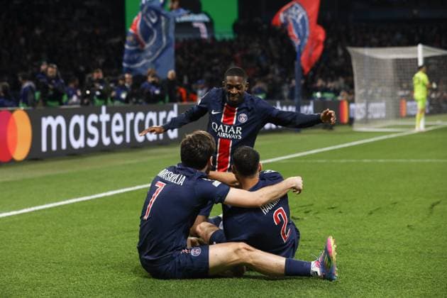 April 9, 2025, Paris, Ile-De-France, France: KVICHA KVARASTKHELIA 7 of PSG celebrates with his teammates OUSMANE DEMBELE and ACHRAF HAKIMI for scoring their side s second goal in the UEFA 2024 25 Quarter-Final first leg game between PARIS SAINT GERMAIN and ASTON VILLA at the Parc des Princes stadium in Paris, France Paris France - ZUMAc179 20250409_zep_c179_036 Copyright: xMickaelxChavetx