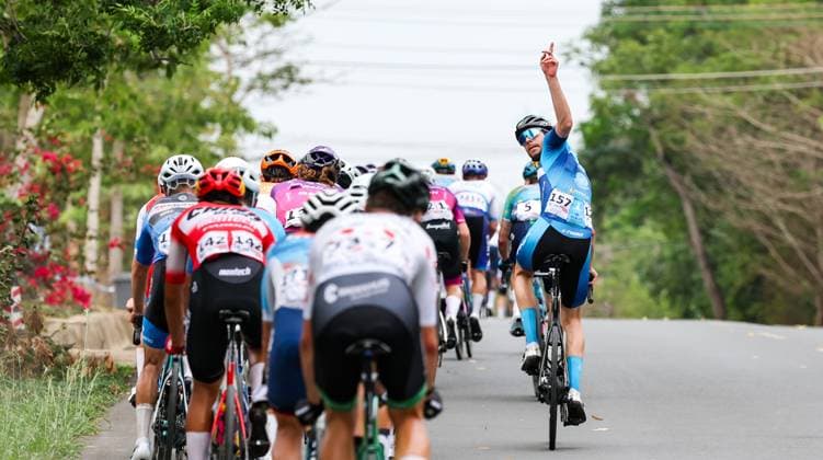 (250410) -- DONGFANG, April 10, 2025 -- Jonas Rapp (1st R) of FNIX-SCOM-Hengxiang Cycling Team gestures during Stage 4 at the 16th Tour of Hainan cycling race from Baoting to Dongfang, south China s Hainan Province, April 10, 2025. ) (SP)CHINA-HAINAN-DONGFANG-CYCLING-TOUR OF HAINAN (CN) YangxGuanyu 