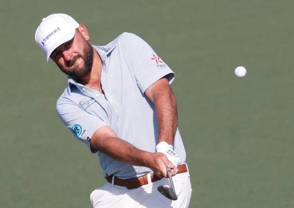 Stephan Jaeger of Germany chips to the green on the second hole during the first round of the Masters golf tournament at Augusta National Golf Club in Augusta, Georgia on Thursday, April 10, 2025.  AUG20250410520 TANNENxMAURY