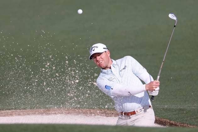 Max Greyserman hits out of a bunker on the second hole during the first round of the Masters golf tournament at Augusta National Golf Club in Augusta, Georgia on Thursday, April 10, 2025.  AUG20250410523 TANNENxMAURY