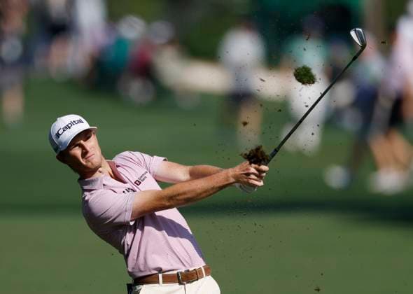 Will Zalatoris hits his approach shot to the seventh green during the first round of the Masters golf tournament at Augusta National Golf Club in Augusta, Georgia on Thursday, April 10, 2025.  AUG20250410549 JOHNxANGELILLO