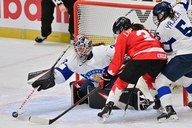 L-R goalkeeper Emilia Kyrkko (FIN), Jocelyne Larocque (CAN) and Siiri Yrjola (FIN) in action during the IIHF Women s World Championship, WM, Weltmeisterschaft Group A, match Canada vs Finland, in Ceske Budejovice, Czech Republic, on April 10, 2025. (CTKxPhoto VaclavxPancer) CTKPhotoP2025041008417  CTKPhotoP2025041008417