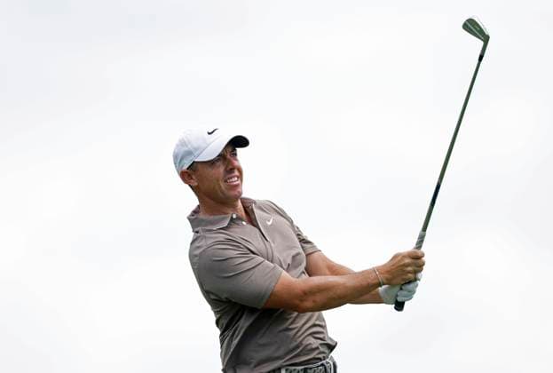 Rory McIlroy of Northern Ireland watches his tee shot on the fourth hole during the first round of the Masters golf tournament at Augusta National Golf Club in Augusta, Georgia on Thursday, April 10, 2025.  AUG20250410633 JOHNxANGELILLO